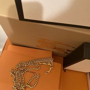 NWOT Coach 45” gold tone chain. Never Used